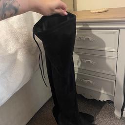 Lovely over the knee black suede boots
Size 6
Has adjustable strap at the back to adjust tighten round the leg. Zip on inner leg so easy to get on. From river island. 
Good condition. Collection Sutton Coldfield b75 or can deliver locally. Check out what else I’m selling on my page :)