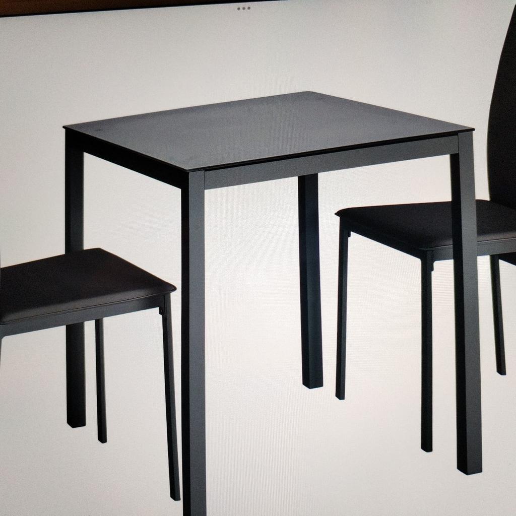 Glass dining white table top is black and 2 black chairs
H 76 x 72 x 70 cm
Le39la Leicester