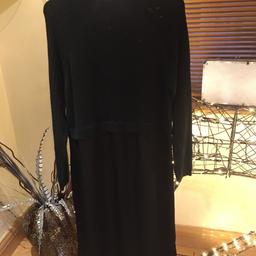 River island black dress size 16 
Woolly jumper style at the top fabric at the bottom