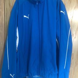 as in picture blue puma track top on worn few times too big