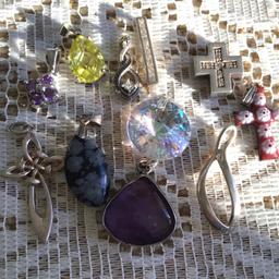 11 various style and size pendants as seen ,all set in 925 silver See photo with 20 p the show size
No chains ,but can easily be put on a silver chain of your choice
£15 o n o for all 11 sold together