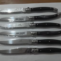 NEW 6 x LLAGUIOLE steak knives set

Introducing the latest addition to your kitchen - a set of 6 sleek and stylish knives pieces that are perfect for your next dinner party.

Each piece is made of high-quality stainless steel and it boasts a sleek black handle for a touch of sophistication.
The colour of the handle can be not completely black, as there is sometime a shade of white in it (please check handle like in the 2nd knife from the top of the picture).

Perfect for hosting dinner parties or simply enjoying a delicious steak at home, this set is designed to serve 6 people, making it ideal for families and larger gatherings.

With their elegant design and superior craftsmanship, these cutlery pieces are sure to impress your guests and elevate your dining experience.

Order now, add a touch of sophistication to your home!

Free Royal Mail Tracked 48 delivery to mainland UK.

Payment with paypal for added guarantee for buyer and seller.