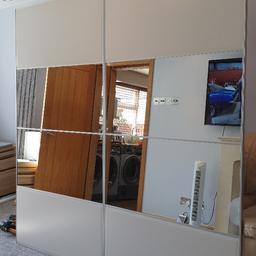 2x wardrobes each 75cm wide 
201cm high 150cm width and 58cm depth 
when assembled together white in colour 
white gloss glass and mirror panels fitted with NEW soft close device for sliding doors 
internal specifications as listed 
2x 75cm soft close draws 
2x 75cm pull out baskets 
2x 75cm shelves 
2x 75cm clothes rail 
all instructions manual available and parts to assemble 
WARDROBE NOT PREVIOUSLY ASSEMBLED suggested layout last picture 
45