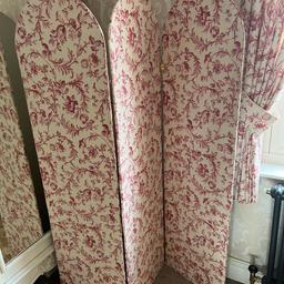 Lovely arch top folding screen

Covered to one side in Laura Ashley “Ironwork Scroll” fabric in raspberry on cream linen, but easily recovered.

Painted off white to the reverse

Fancy brass hinges

Perfect for a bedroom, dressing room or bathroom