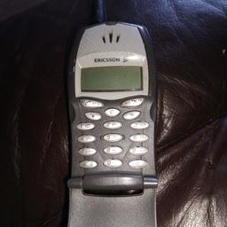 sony ecrisson vintage original fllp phone. locked on orange network. i don't have a charger for it
