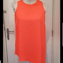 Beautiful Neon Orange Sun Top
Asymmetric Hemline 
Fastening At Back
Excellent Condition

🌟🌟🌟 Pase take a look at my other listings,🌟🌟🌟🌟

💖 I only sell items that are in good condition (UNLESS DESCRIBED)
& I would be happy to buy myself.💖

📮 I'm happy to combine postage.... 📮

💛 Collection Dudley DY1 2DS Near Russell's Hall Hospital

👍👍👍 Thanks for looking, 👍👍👍
🛍👛 Happy Shopping 🛍👛