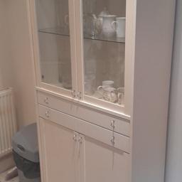 Vintage tall white dresser cabinet with bottom cupboard with shelves, two drawers & glass fronted top with glass shelves, in excellent condition just needs a bit of a clean.
Collection only from B79 area & will need two people to carry down a flight of stairs.