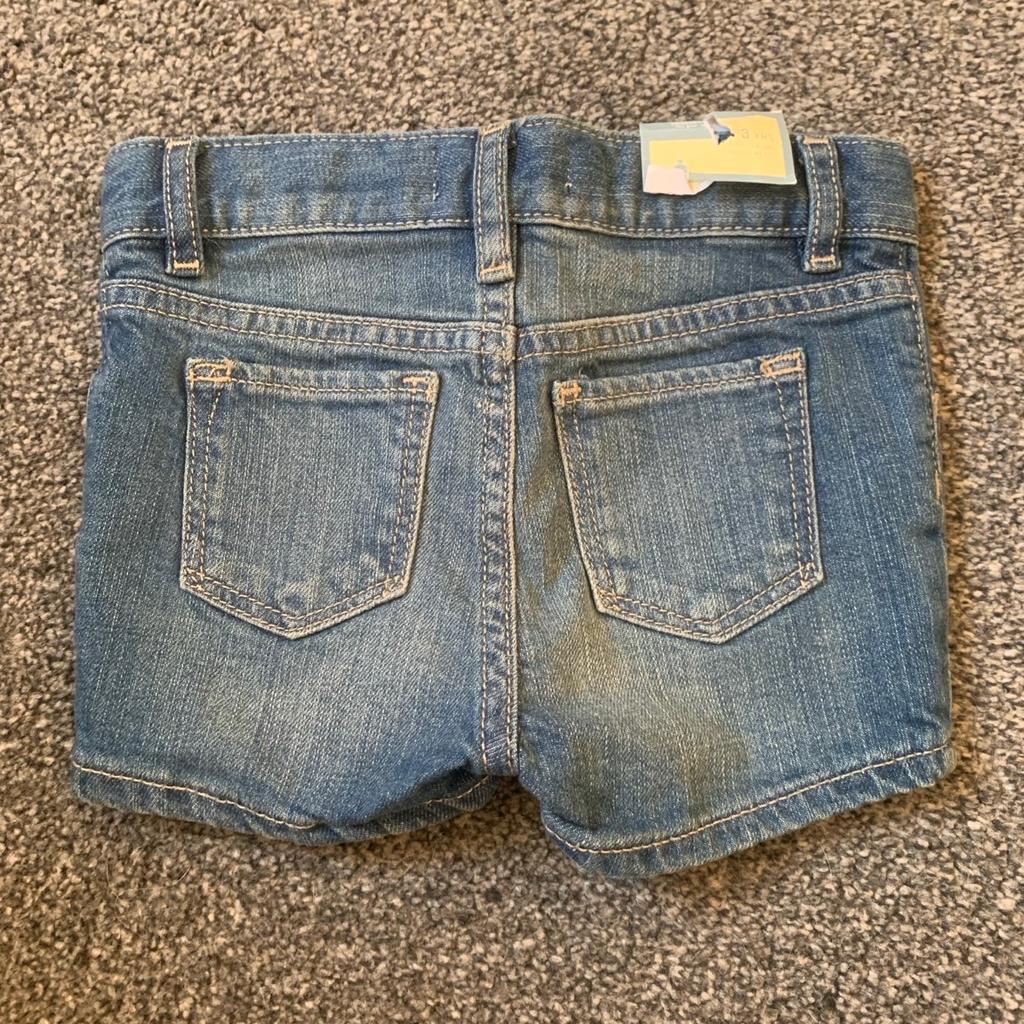 Baby Gap denim shorts. Aged 3 years. New with tags. If postage is required, postage costs will be extra.