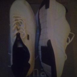 branded trainers white colour white and black bottom grip trainers wrong size so selling.
