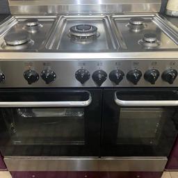 Baumatic double oven gas cooker 5 ring large oven one sode is not working just needs checking but everything else working fine quick sale