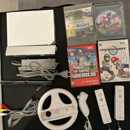 Verkaufe gut erhaltene Nintendo Wii mit Zubehör mit 2 Controller+Lenkrad+4 Spiele (auch Einzelverkauf möglich) aus Nichtraucherhaushalt