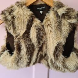 Domino Girl Fur Shrug.

Baby Girl Faux Fur Gilet- label size 11/12.  Not worn as forgotten item.

Winter Warm Girls Sleeveless Body Vest Coat with Fluffy Thick  faux fur.

No zip to snag or buttons, as easy to put on & stay warm.

Local collection preferred or can be posted out at extra costs.