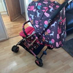The lightweight, compact-fold stroller, 25kg capacity, rain cover and bell. In good condition.