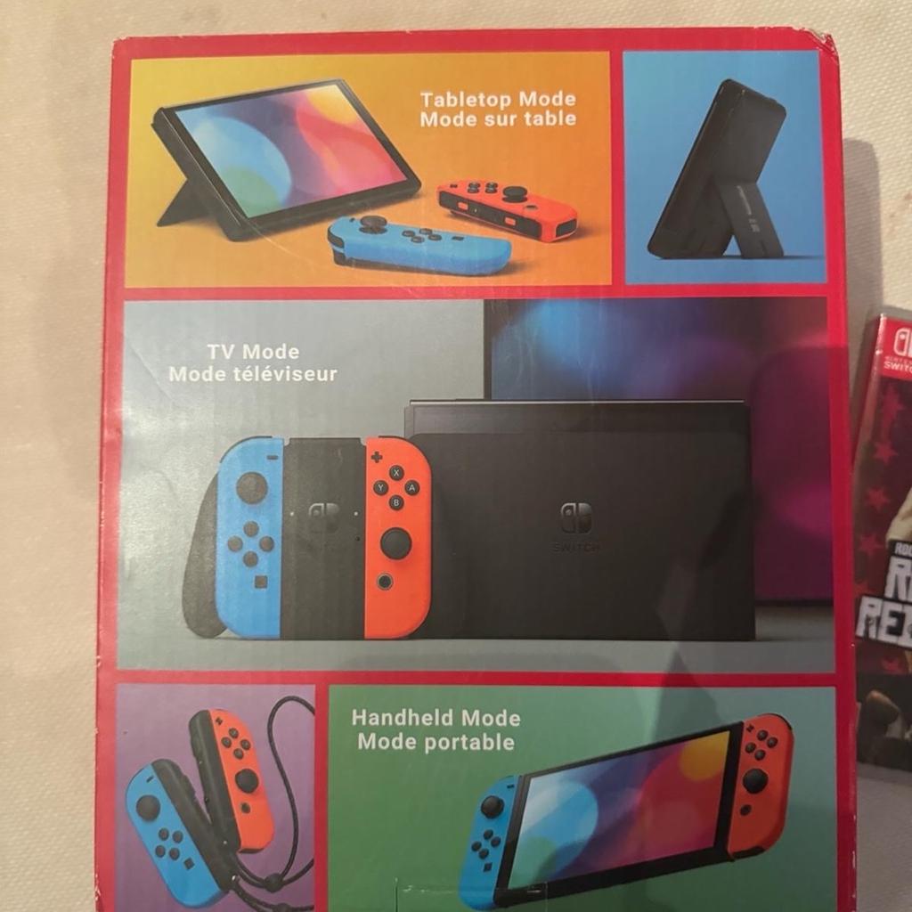 Brand new Nintendo switch OLED with free red dead redemption game! Unwanted Xmas present so still in original box and unopened