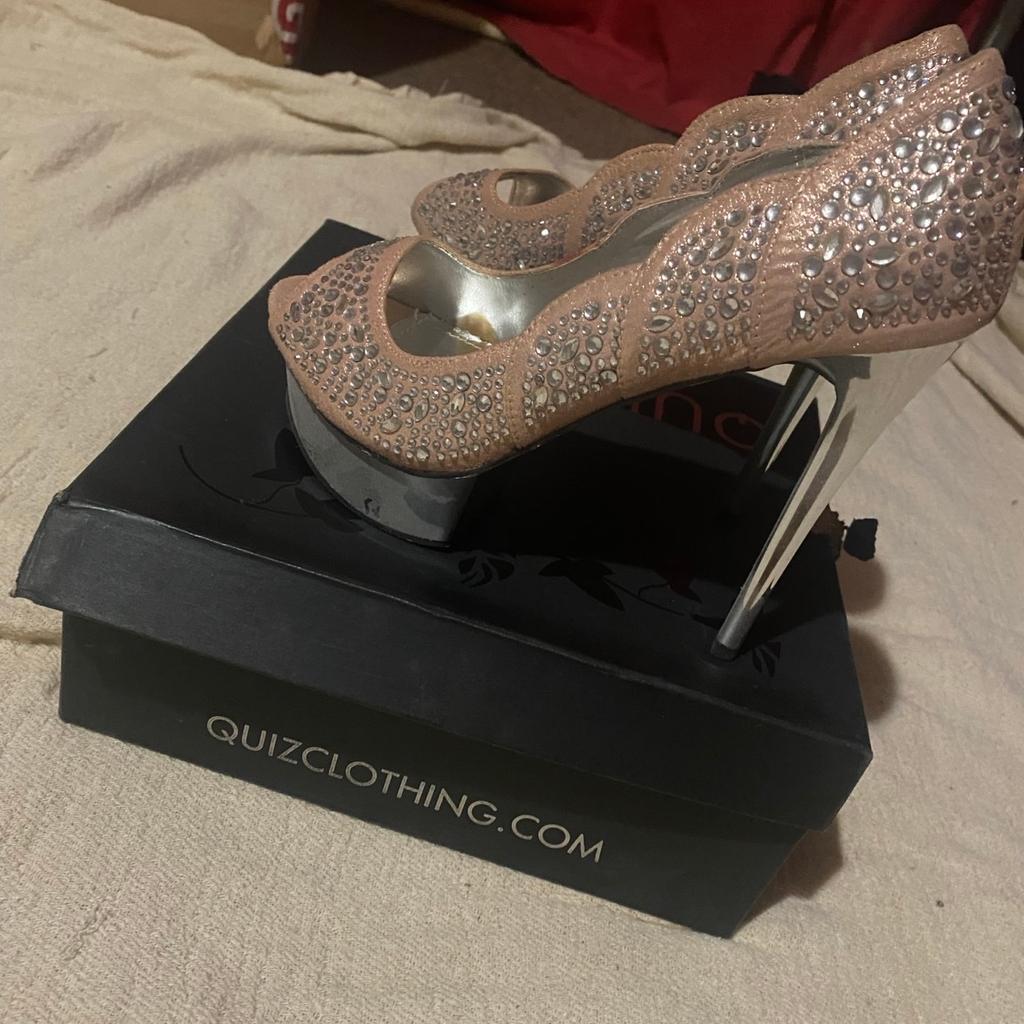 Still in box perfect for wedding or occasion very high heels chrome colouring on bottom and pale pink with gems