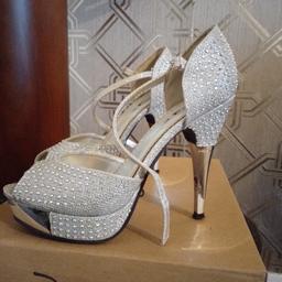 lovely heeled shoes size 4 with box brought them for wedding so only wore that 1 day in new condition just a small scuff on heel if can see in pic because of lighting pick up only £10
