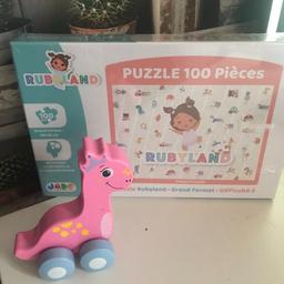 THIS IS FOR A BUNDLE OF BRAND NEW TOYS 

1 X RUBYLAND JIGSAW WITH BABY TOY THEME - NEW AND SHRINK WRAPPED 
1 X WOODEN PRINCESS DINO TOY ON WHEELS  - USED

PLEASE SEE PHOTO