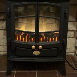 Hardly used

Authentic flame effect creates a cosy ambience
Realistic coal effect fuel bed
2000 Watts of power
2 heat settings to choose from
Can be operated by remote control