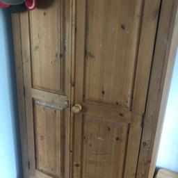 Solid pine single wardrobe in good condition a few marks on the doors but easily sanded and re stained not a cheap robe and very solid