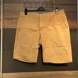 Men’s H&M Beige Chino Shorts. 

Hidden Button missing but spare button attached to label. Size 38 waist NOT LARGE