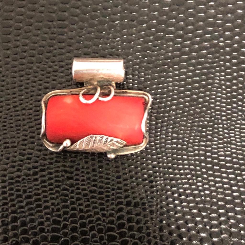 Old vintage pendant hallmarked 925 and other stamp with genuine natural coral . In good condition pls look at the pictures attached for more details can accept PayPal,collection,bank transfer or delivery if close by . Shpocks wallet too