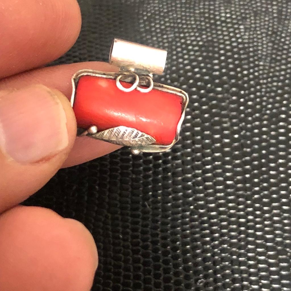 Old vintage pendant hallmarked 925 and other stamp with genuine natural coral . In good condition pls look at the pictures attached for more details can accept PayPal,collection,bank transfer or delivery if close by . Shpocks wallet too