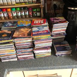 Over 800 discs movies and music 99% of these have never been taken out of the sleeves collected from magazines over many years some classics
