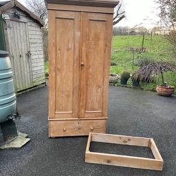 Antique pine 2 door wardrobe 
This is a lovely antique pine wardrobe. 
It has a base drawer and 2 doors. Hanging rail. 
It breaks down into 3 sections. Base , main section and pelmet 
Viewing welcome