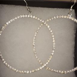 brand new sterling silver large cz hoop earrings fully hallmarked postage to be covered if needed plz thanks