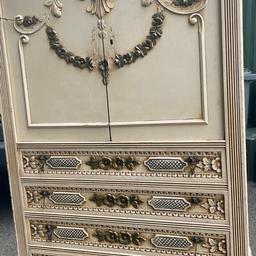 Very ornate. Heavily carved detail
This is a very heavy well made beautiful piece of furniture. 
It does not split. One piece. It has a 2 door cupboard over 4 drawers.
Please see photos for description.
Viewing welcome