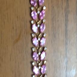 Leaf shaped pink diamantés with white stones, bracelet, 7”/17.5cms New, unworn

Can deliver locally in Coventry for £5 fuel cost or BUYER PAYS FULL POSTAL COST  (Delivery price is only a guide price)
