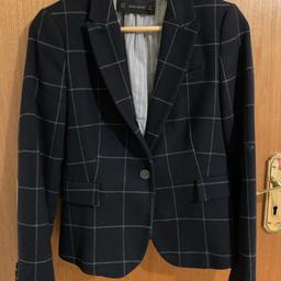 This wool blazer has been used and is in very good condition. No faults or defects. Keeps you warm too :)