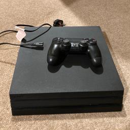 PS4 Pro 1TB console with 1 controller, power cable, HDMI cable and 6 games. 

The games are:
Jump Force
Soul Calibur VI
Tekken 7
Injustice 2
Dragon Ball Fighter Z
Street Fighter V: Champion Edition

Console, controller and games are all in perfect working order.