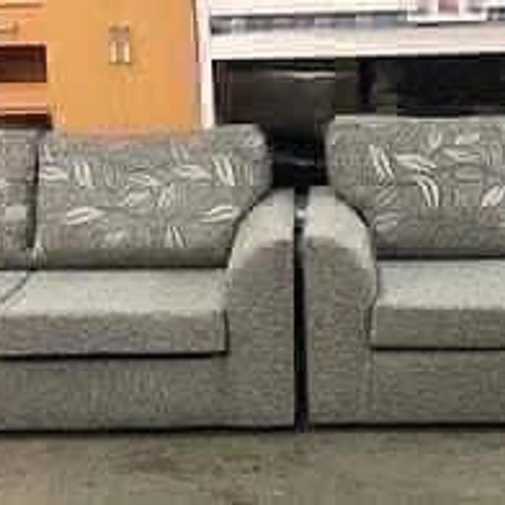 3+2 Byron sofa in silver with floral pattern in S62 Parkgate for £550.