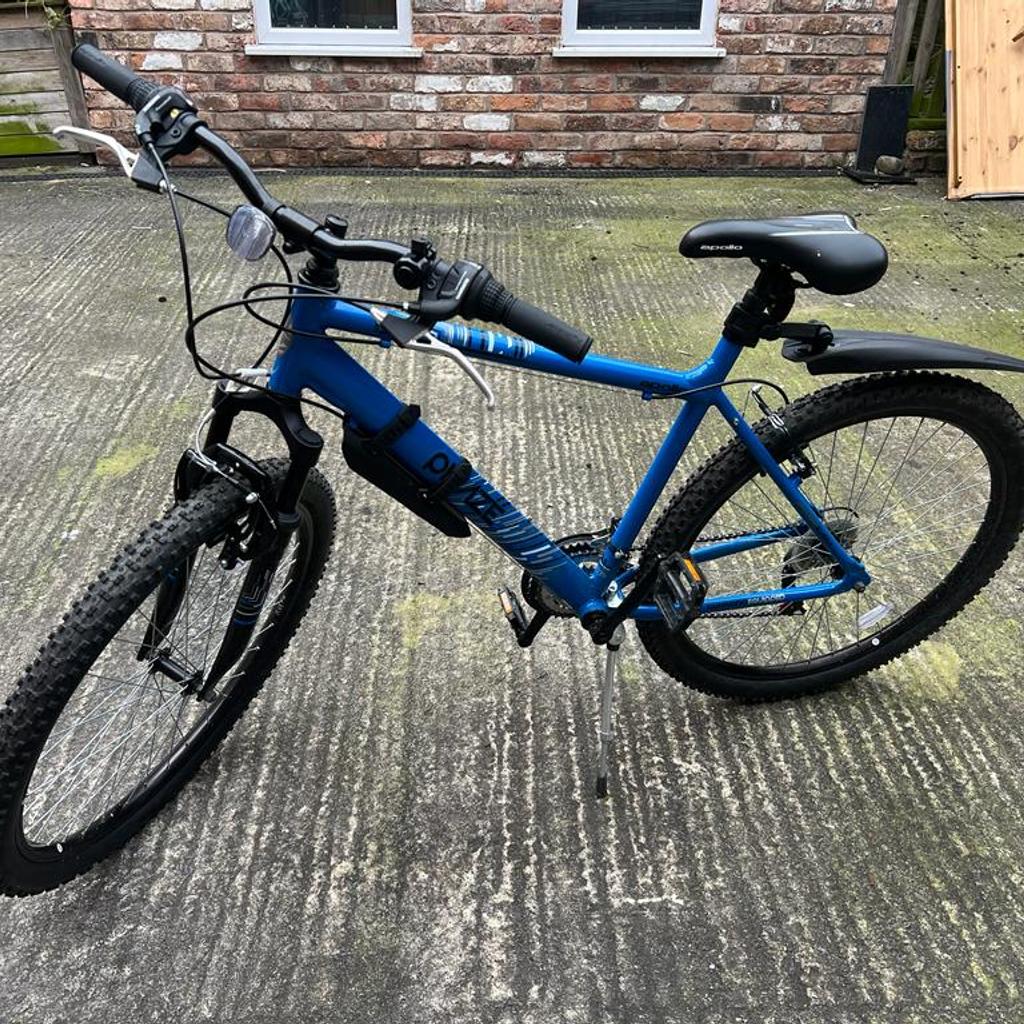 Almost new Apollo Slant Mens Mountain Bike + Lock worth £35 +Cover worth £10 + Air Pump

 - Large Frame size (27.5 x 20")
Frame: Sturdy steel frame
Forks: Suspension forks
Gears: 18 speed Shimano gear set
Brakes: Steel V-brakes
Wheels: 26inch Kenda tyres
Suspension: Front Suspension