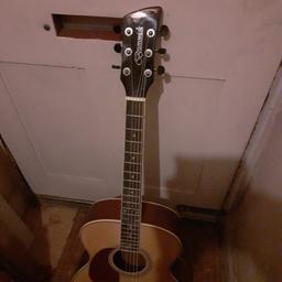 full size acoustic guitar 
low action
tuned
New strings 
no dents  or scratches 
07740174379