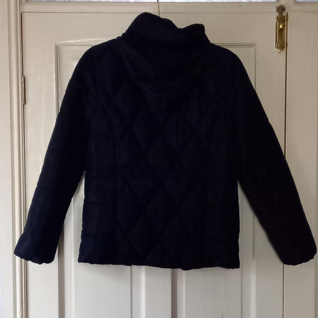 Lovely navy blue quilted cropped waterproof hooded coat from M&S. Hardly worn in very good condition.