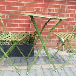 Here we have a folding metal garden table and 2 chairs. In great condition with age related wear and tear as shown in attached pictures. Ref.  (#1255)

 Table
 Height........ approx  27.5 inch / 70 cm
 Width........  approx 23 inch / 58.5 cm
                                                                                  
 Chairs 
 Height........ approx  31 inch / 79 cm
 Width........  approx 16 inch / 41 cm                                                                                                                              
 Depth........  approx 16.5 inch / 42 cm

Pick up only, Dy4 area. Cash on collection.