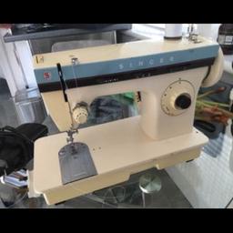 Singer sewing machine still sews just needs new foot pedal or to be used for spare parts.