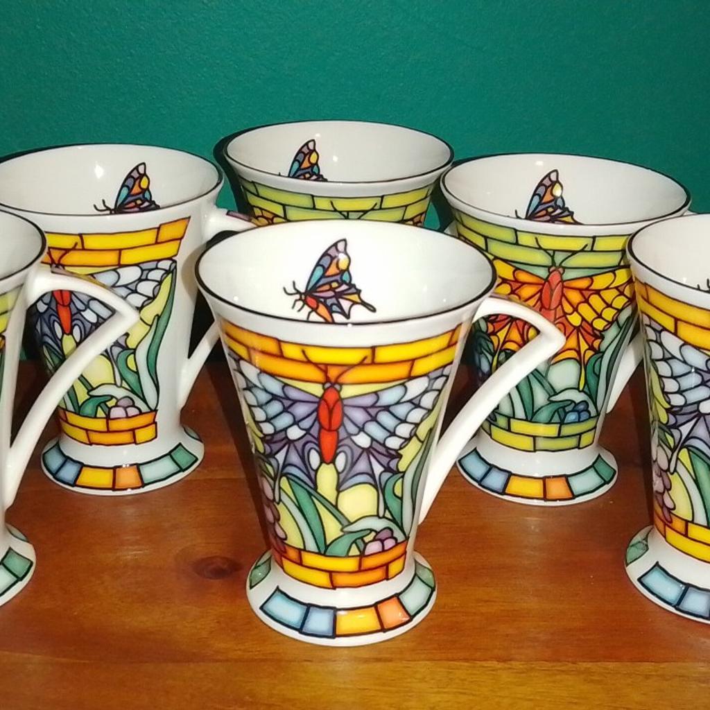 £2 Each or all 6 for £10. Fine Bone China Cups by Staffordshire Tableware in a Mosaic butterfly design, 3 in orange and 3 in blue with a butterfly detail on the inside and pattern on handle. 4.5" High. Excellent Condition, no chips, breaks or cracks. Collection from Leeds 13/12 Area.