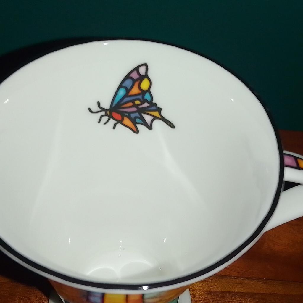 £2 Each or all 6 for £10. Fine Bone China Cups by Staffordshire Tableware in a Mosaic butterfly design, 3 in orange and 3 in blue with a butterfly detail on the inside and pattern on handle. 4.5" High. Excellent Condition, no chips, breaks or cracks. Collection from Leeds 13/12 Area.