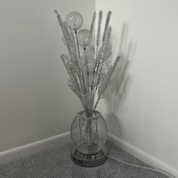 Beautiful floor lamp in silver, excellent condition, rare item, looks beautiful when lit and not. Only selling due to change in decor