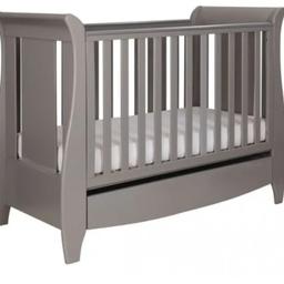 3 in 1 cot bed with very spacious under bed storage.

Never used as child co-slept with us.

Bed is originally £389 online
