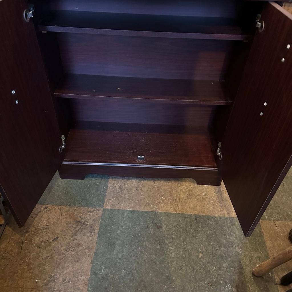 Hall alcove cabinet , red mahogany effect , 2 doors , shelving inside , odd marks , sizes in cm w 70.5 ,d 27 , h 74 , can be delivered locally for a charge , 07784859403