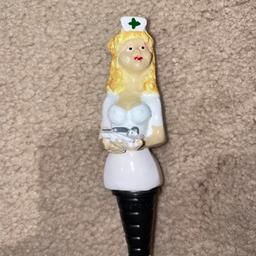 Fun Nurse character Bottle Stopper for the Nurse in your life., who likes a drink or two! Like new, from a pet free, smoke free house.