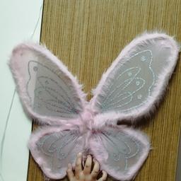 Pink fairy wings with fur trimmings and glitter.comes with its own pouch. Can post out on additional cost