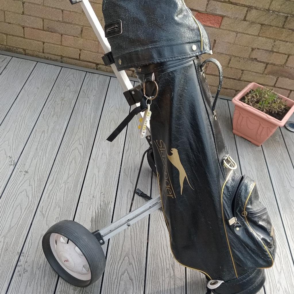 Set of Pinseeker golf clubs, 2 putters and 3 metal drivers, Slazenger bag and fold away trolley all good condition £45
