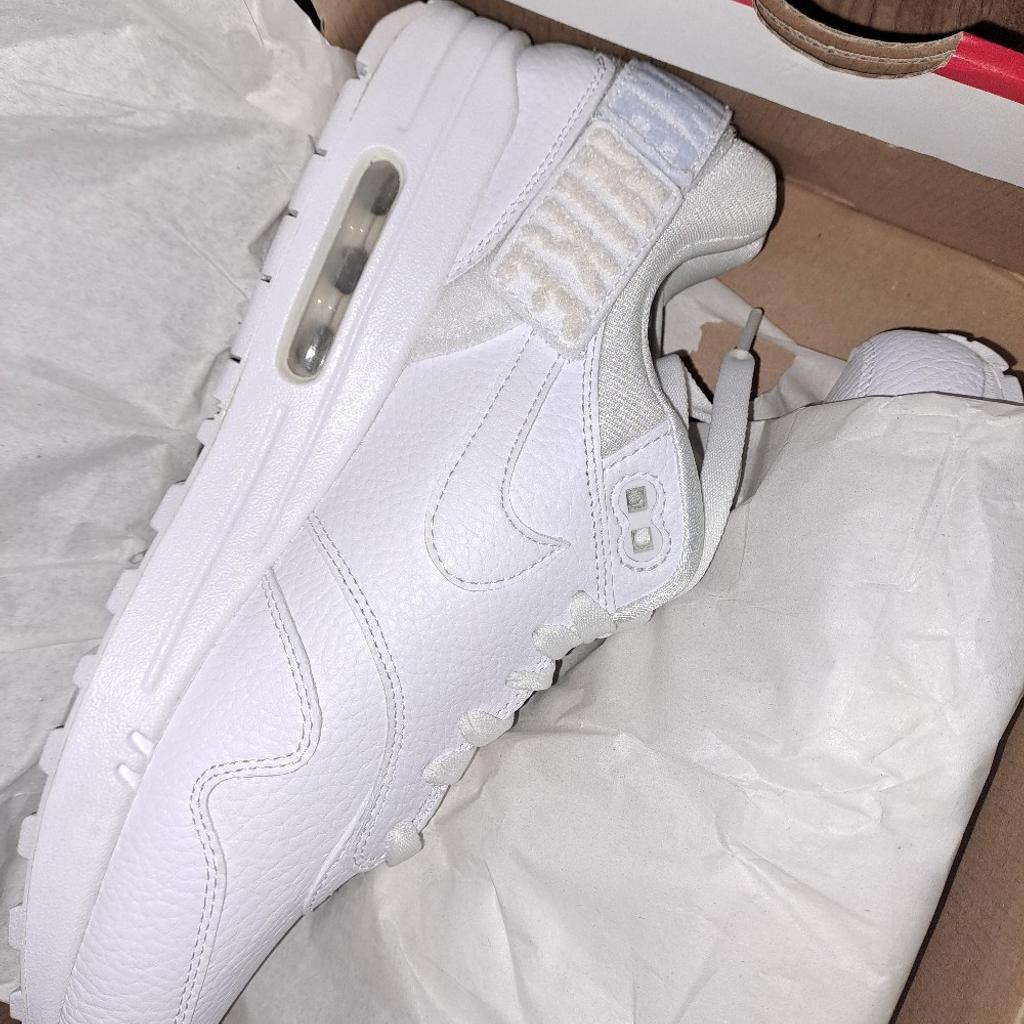 **BRAND New** Nike Airmax 1. Size 7UK. Colour White. The Velcro patches can be taken off the trainers as seen in pictures.