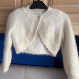 Lovely cream coloured Next cardigan to go over a dress. 12/18 months great condition