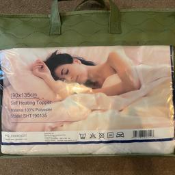 Self-Heating Double Bed Mattress Topper.

Brand New